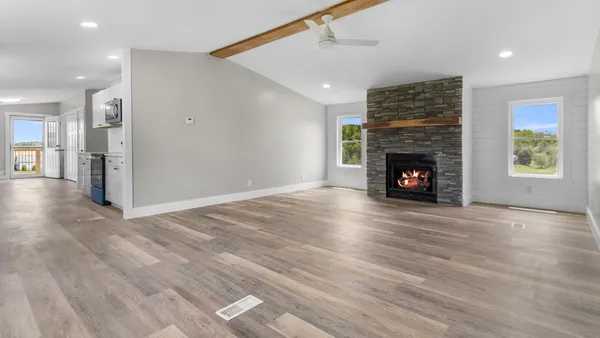 Professional real estate photography showing proper staging and lighting in a living room